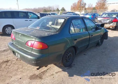 2001 Toyota Corolla Le z USA, uszkodzony, nr VIN 2T1BR12E31C458278